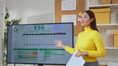 A group of business professionals stands in a modern corporate office, actively engaged in an ESG-focused brainstorming session, analyzing convergent strategies with agile planning methods 