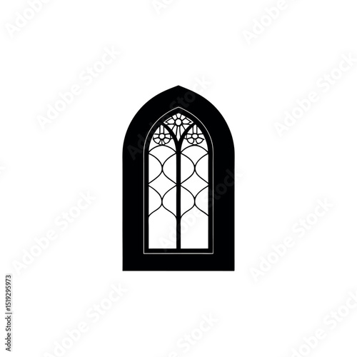 Ornate Gothic Window with Intricate Floral Details and Arched Design in Black and White