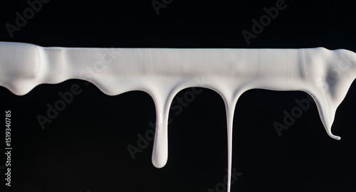 Dripping paint on a dark background