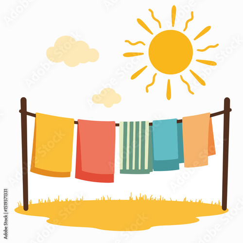 Bright sun shines on colorful towels drying on clothesline.  Freshly laundered towels hanging outdoors to dry quickly under summer sun.  Perfect image for laundry, cleaning, or summer themed projects.