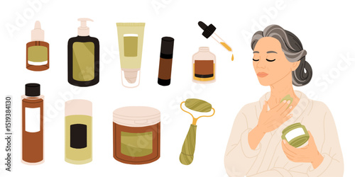 Middle aged East Asian woman with braided gray hair in white bathrobe applying night cream to neck as part of skincare routine. Evening self care for mature skin and graceful aging.
