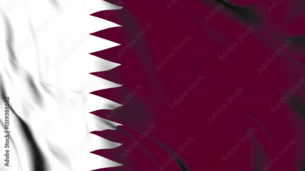 The Qatar country flag waves in the wind.