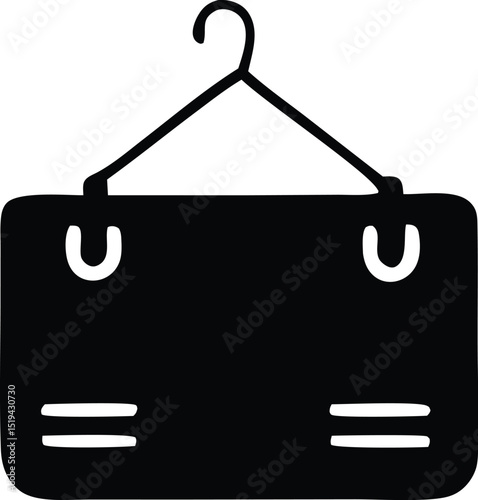 Black rectangular sign hanging from a simple clothes hanger