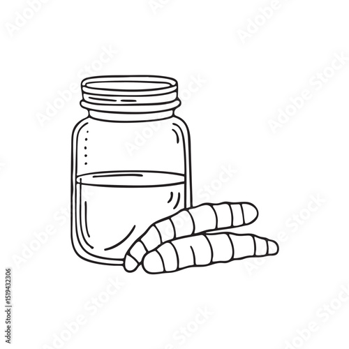 A turmeric root set close to a glass jar