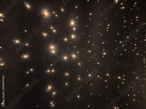 Sparkling Golden Lights on Dark Background
