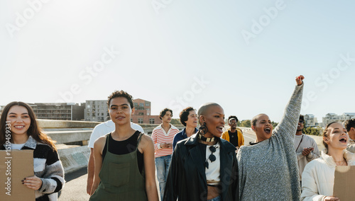 Diverse group demonstrating together during a peaceful protest on a sunny day