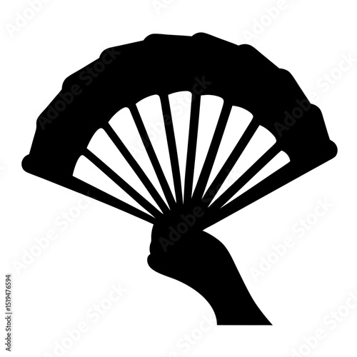 Silhouette of hand holding an open fan with detailed design work