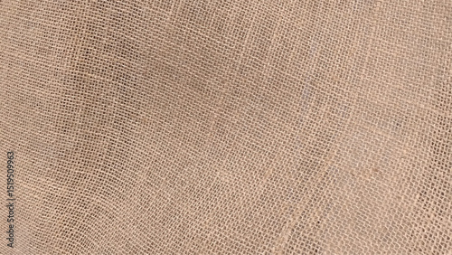 Jute pattern, rough burlap texture. Brown burlap cloth background or sack cloth for packing.
