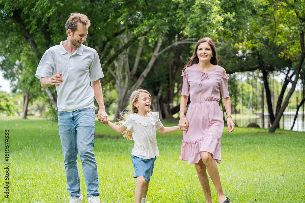 Fototapeta premium Happy family parent children having picnic outdoor activity. Enjoy happiness moment summer playing together including father mother son and daughter relaxing in the morning sunrise.