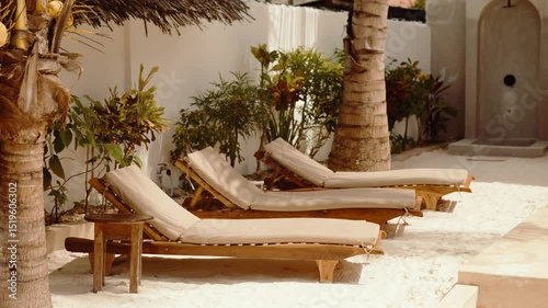 Hotel swimming pool sun lounger, travel accommodation boutique apartments