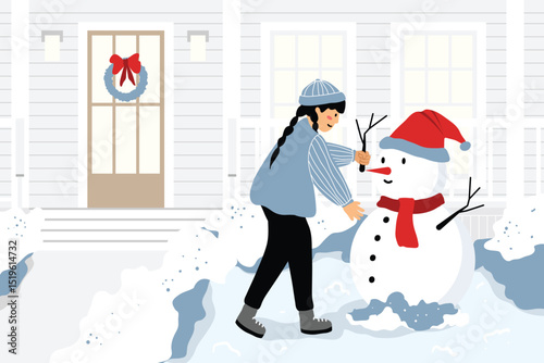 Girl building a snowman in front of a house in winter.