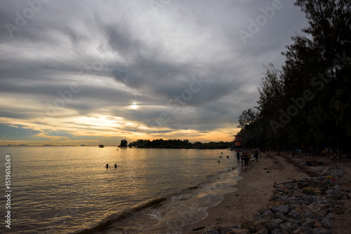 Wallpaper Mural Golden Hour Serenity at Pantai Kelanang Beach, Banting, Malaysia. A tranquil sunset scene at Pantai Kelanang Beach, located in Selangor, Malaysia. Torontodigital.ca