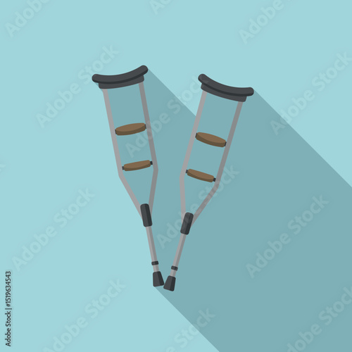 Crutches resting against a light blue wall, symbolizing recovery and support