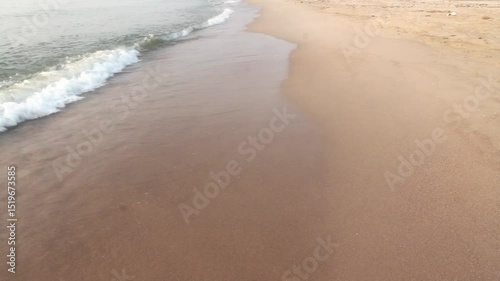 Sea waves hitting the shore.