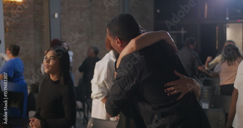 Canvastavla Diverse congregation members exchanging hugs and smiles in a modern church setti