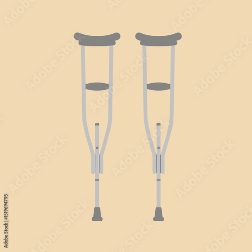Two crutches standing upright against a soft beige background, symbolizing support and recovery