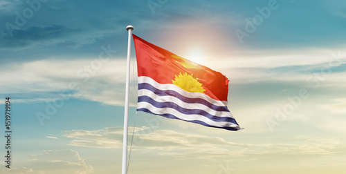 Kiribati national flag waving in beautiful sky with mast. A proud moment flag waving with sunlight. photo