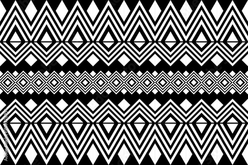 Black and white geometric tribal pattern in a native, African-inspired style. Symmetrical and abstract design suitable for backgrounds, textiles, decor, or graphic projects.
