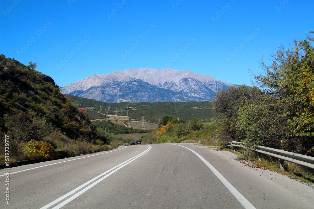 Naklejka premium On the road with view at Mount Parnassus mountain range in Greece