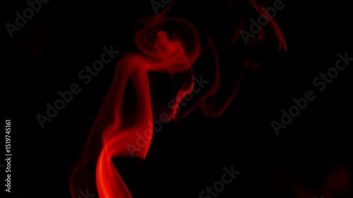 Red smoke pattern in the dark.Smoke background in black and red tones.Mystical atmosphere with fog and smoke. 4k footage