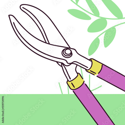 Garden shears with colorful handles against green foliage background  