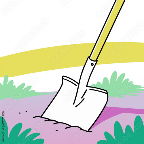 Shovel digging into the soil surrounded by green grass  