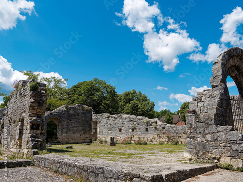 Ruins of the old hospital Saint-Jean of L'Hospitalet and ancient arched portal which welcomed pilgrims before taking the Saint's Way to the sanctuary of Rocamadour (Occitanie)
