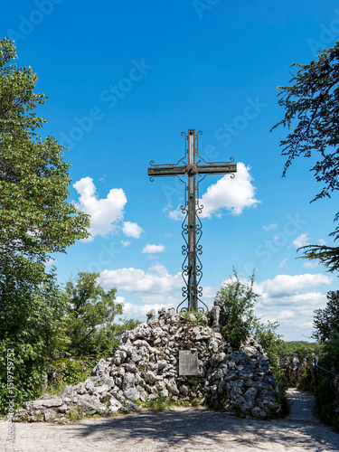 Rocamadour marian City. Jerusalem Cross in garden at the top of the cliff and at the end of the 'Chemin de Croix' overlooking the Alzou Valley and the Causses du Quercy
 photo