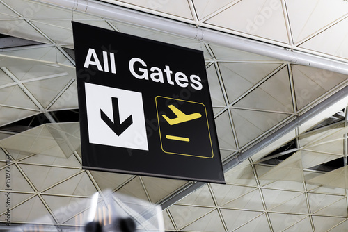 All gates sign at airport with setting off plane icon. Travel concept. photo