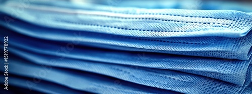 Stacked blue medical masks
