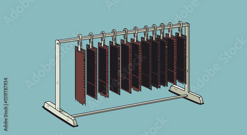 Darkroom film sheets hanging on a rack