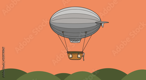 Vintage blimp with basket above rolling hills