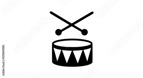 A drum with two sticks on it