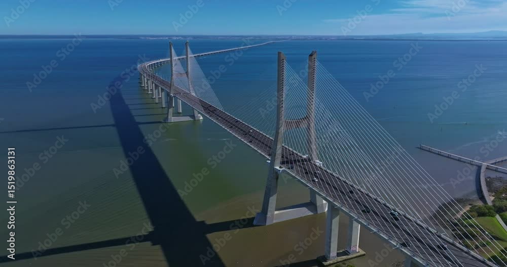 Aerial view of Vasco da Gama bridge crossing the Tagus river in Lisbon, Portugal. Modern design