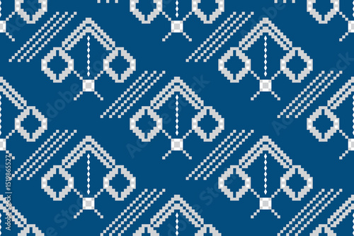 Ethnic pattern of abstract geometric shape in grey and blue. Seamless pattern with concept of geometry, tradition, motifs, ornate, pixel for textile, fabric texture, wrap, print, wallpaper, embroidery