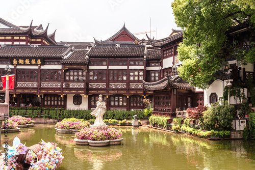 Beautiful Yuyuan Garden in Shanghai features traditional architecture and serene pond