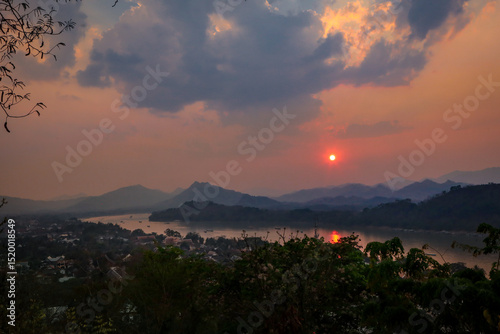 Wallpaper Mural Beautiful red sunset over the mountains, a landscape viewed from the top of the Phousi Hill stupa in Luang Prabang, Laos. Torontodigital.ca