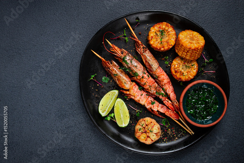 langoustines on skewers, shrimp kebab, with fried corn, spices and herbs, homemade, no people,