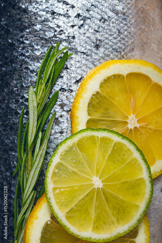 Fresh fish fillet, garnished with lemon and herbs, on a dark background, ready to cook