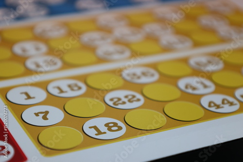 printing of colored and numbered game cards called bingo in the printing house. selective focus