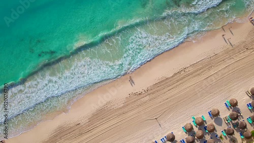 Stunning Aerial Drone Footage of a Secluded Tropical Paradise with Crystal-Clear Waters, White Sandy Beaches, Luxury Resorts, and Palm-Fringed Coastline on a Bright Sunny Summer Day
