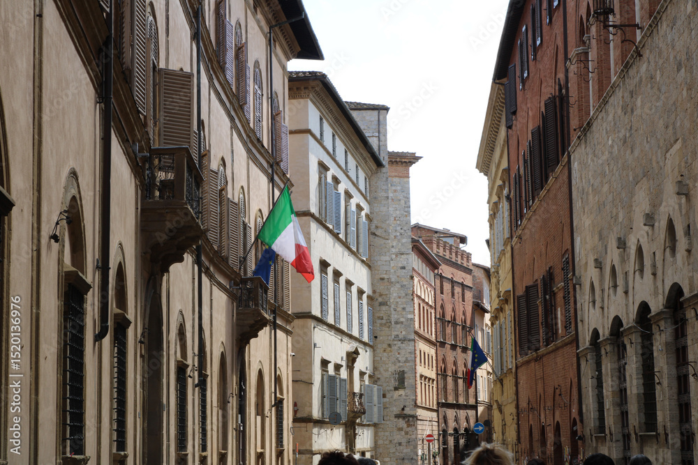 Fototapeta premium The streets of the medieval Siena Old Town. Tuscany, Italy.