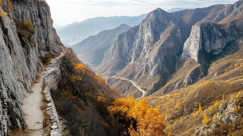 Isolated section of the Great Wall winding around a sharp mountain curve with dramatic landscape