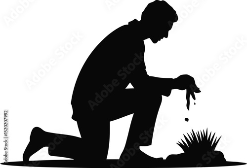 Silhouette of a man kneeling and dripping liquid onto a small plant lifeform