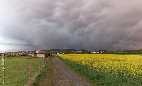 Unwetter über der Kleinstadt Neu-Anspach im Taunus, Hochtaunuskreis, Hessen, Deutschland  photo