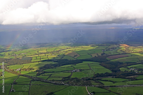 Aerial view of rain above the fields of North Devon, England photo