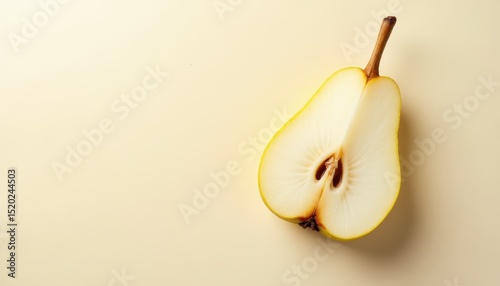 Pear slice on cream background, top view