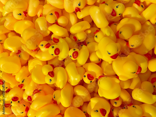 Top View of Dense Pile of Yellow Rubber Ducks with Red Beaks
