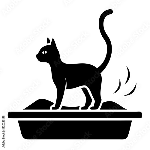 Domestic cat using litter box. Cat hygiene and litter box usage. Pet care and feline sanitation. This image is perfect for pet care guides or veterinary websites.