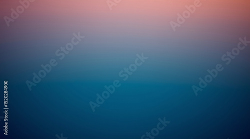 Gradual transition from warm to cool tones in a serene sky at twilight.